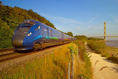 Hull Trains Paragon service passing Humber Bridge