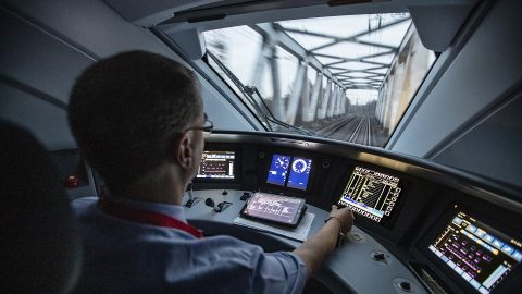 Driver in cab looking towards bridge