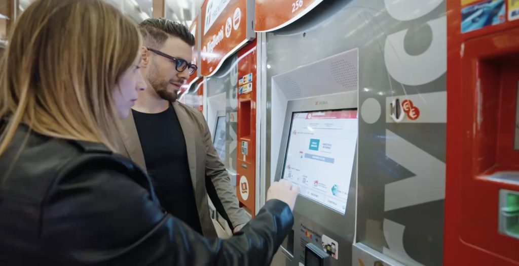 Passengers buying Trenitalia tickets