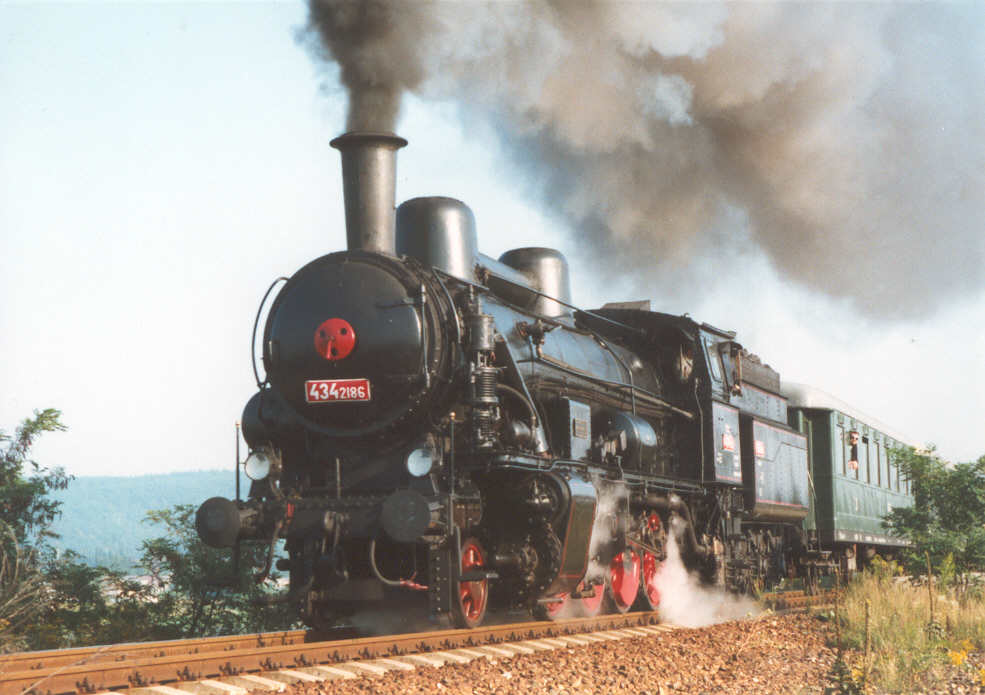 Czechia's steam locomotive class 434.2 going through Praha-Modřany railway stop.