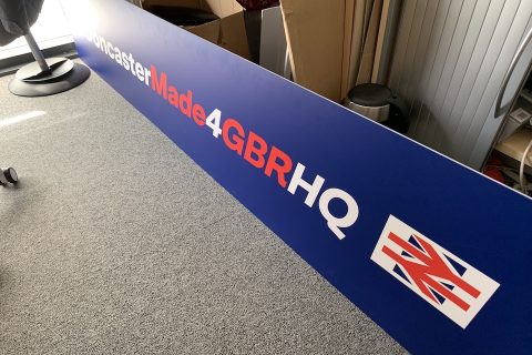 Redundant sign for Doncaster for GBR HQ lying on floor