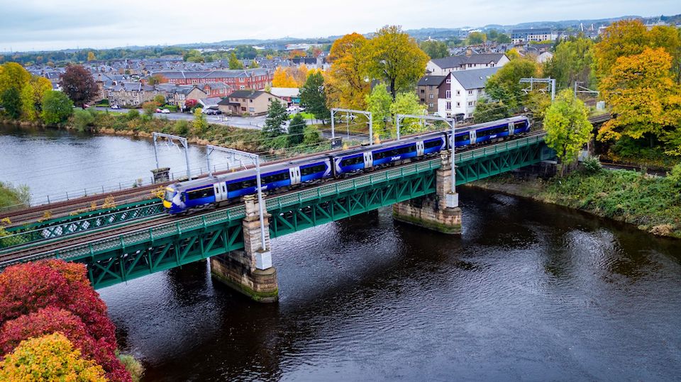 Forth Viaduct over the river at Stirling with ScotRail train in the UK