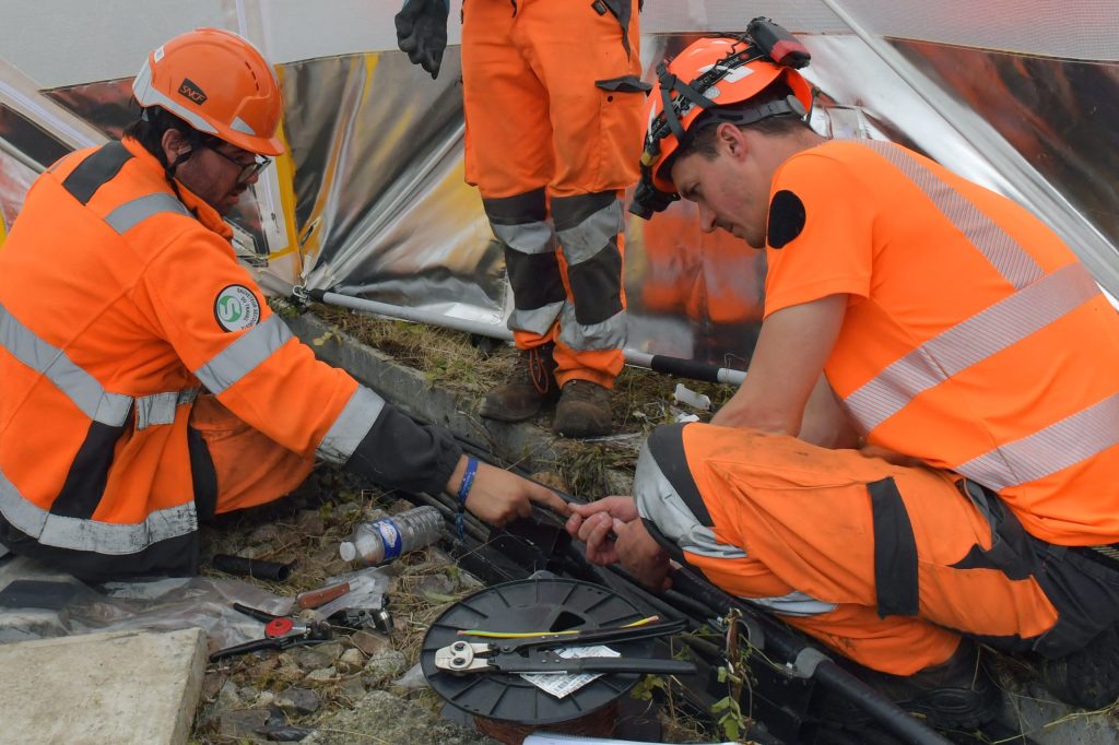 Rail workers repair tracks along France's high-speed railway.