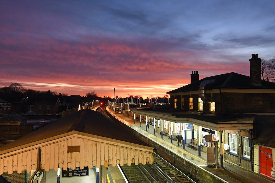 Sunset over Farnham station in Hampshire in England